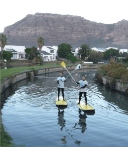 Guy Bubb and Glen Thompson paddling the Steenberg Canal, above Zandvlei, 2011 Peninsula Paddle